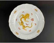 Meissen Porcelain Yellow Dragon Plate: PorcelainÂ dragon plate by Meissen. Large round white plate with yellow dragon and red fire accents. Plate is hallmarked on the underside as pictured. Item is in good condition. Please see p
