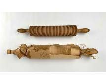 Pair of Antique Swedish Noodle Rolling Pins: 2 noodle rolling pins from Sweden. Both antique rolling pins are wood with slots for rolling out noodle dough. 1 rolling pin does have pieces of its original paper wrapping as pictured. Both items are