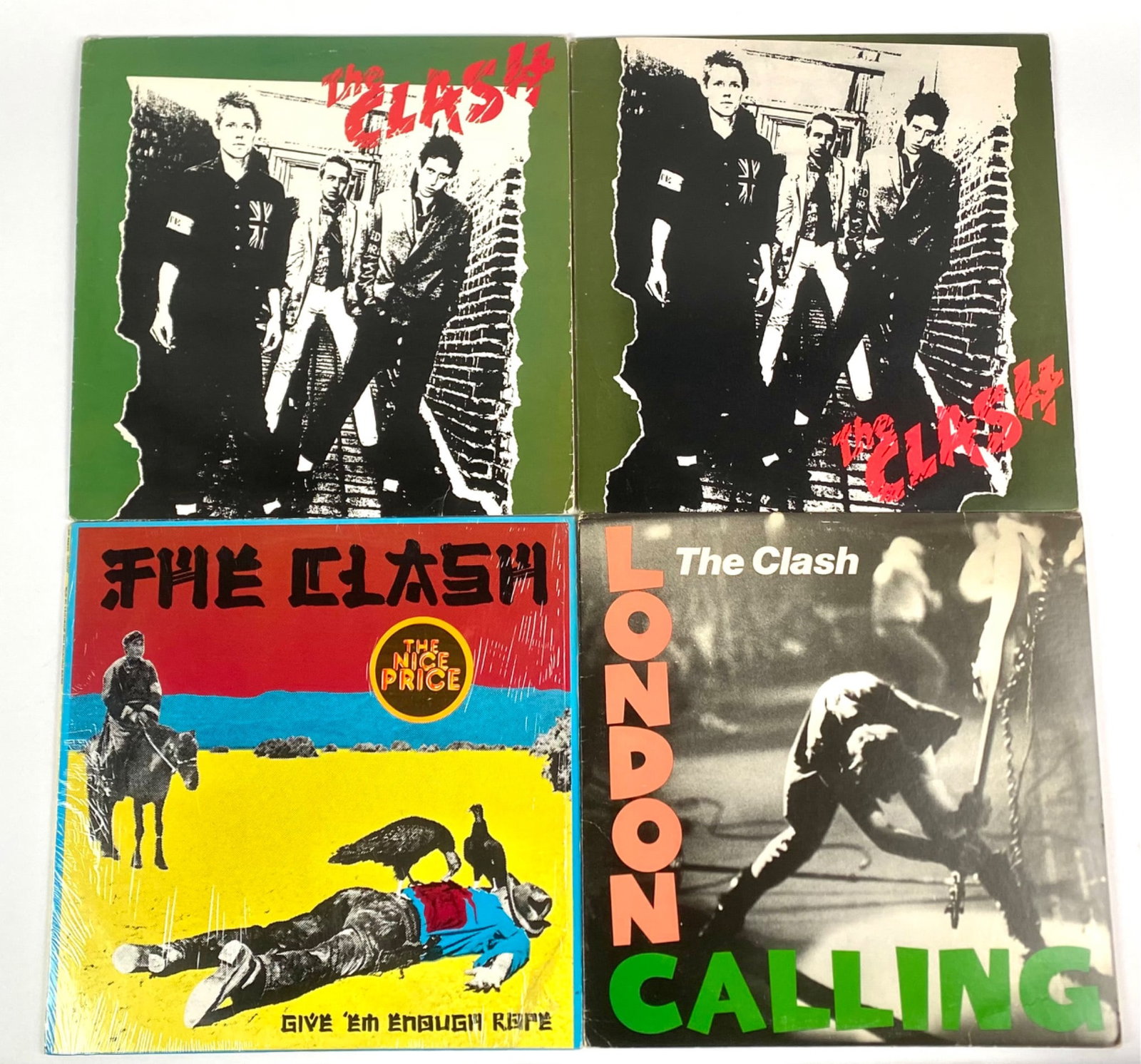 Collection of Four Albums by The Clash Featuring Iconic Titles: A collection of four vinyl records by The Clash, including â€œThe Clashâ€ (green cover, CBS label), â€œGive â€˜Em Enough RopeâS