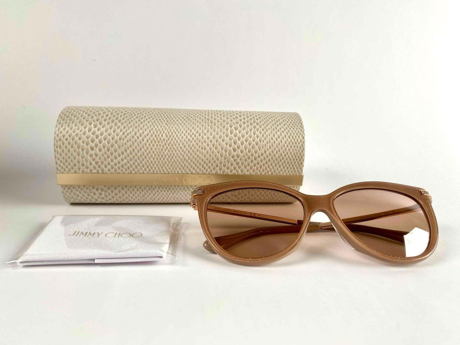 Jimmy Choo Cat-Eye Sunglasses with Case (AXELLE/G/S0FWM2S56): Rose pink Jimmy Choo Axelle sunglasses. Glasses come with case and cleaning cloth. Sunglasses and case are in good condition. Please see photos for additional details. Length of the Front of the Sungl