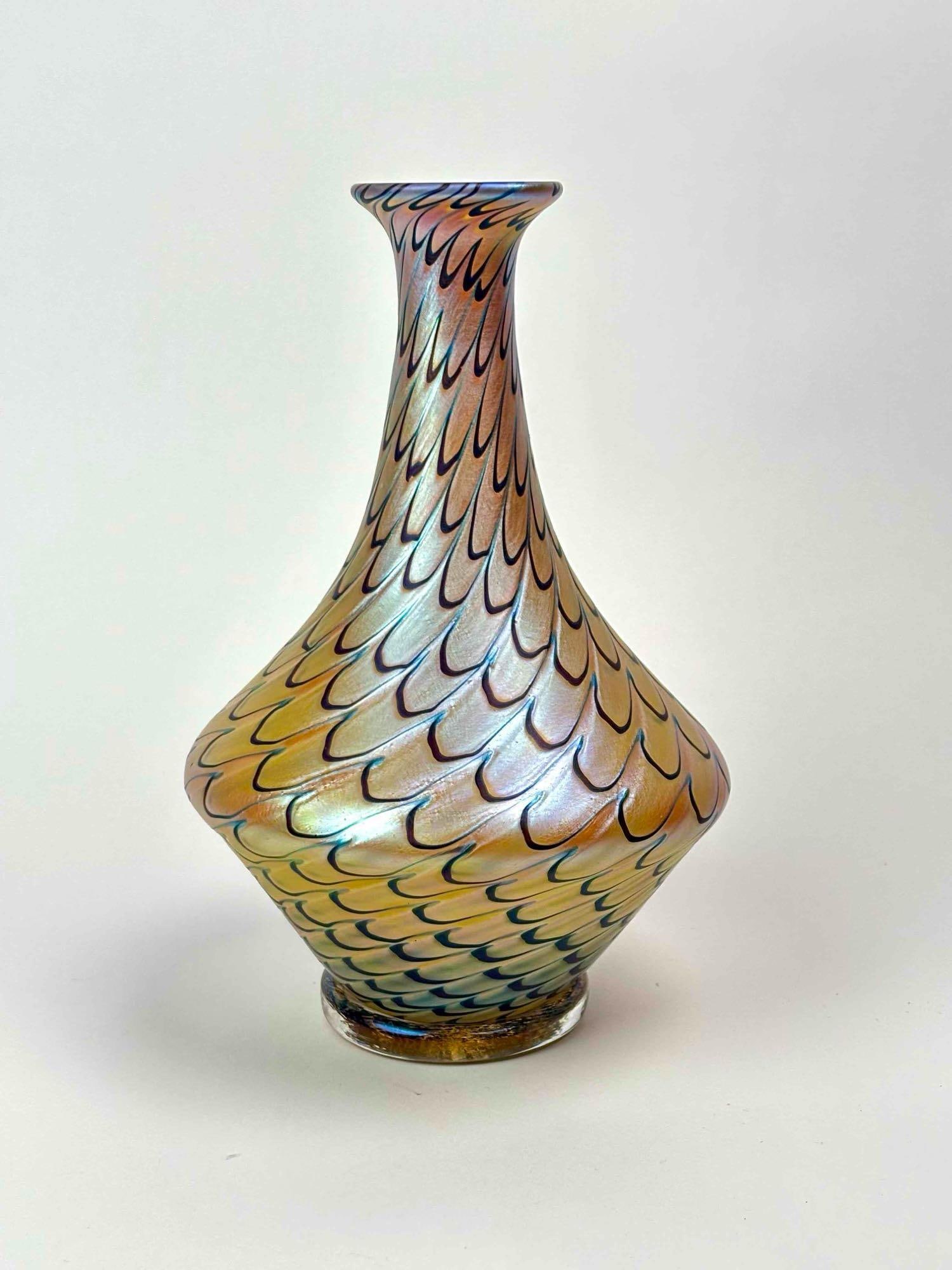 Vizzusi Gold Art Glass Vase: Pulled Feather Vizzusi art glass vase. Vase is iridescent and gold with deep brown/black accents. No chips, scratches, or cracks. Signed on the bottom of the piece. Please see photos for additional de
