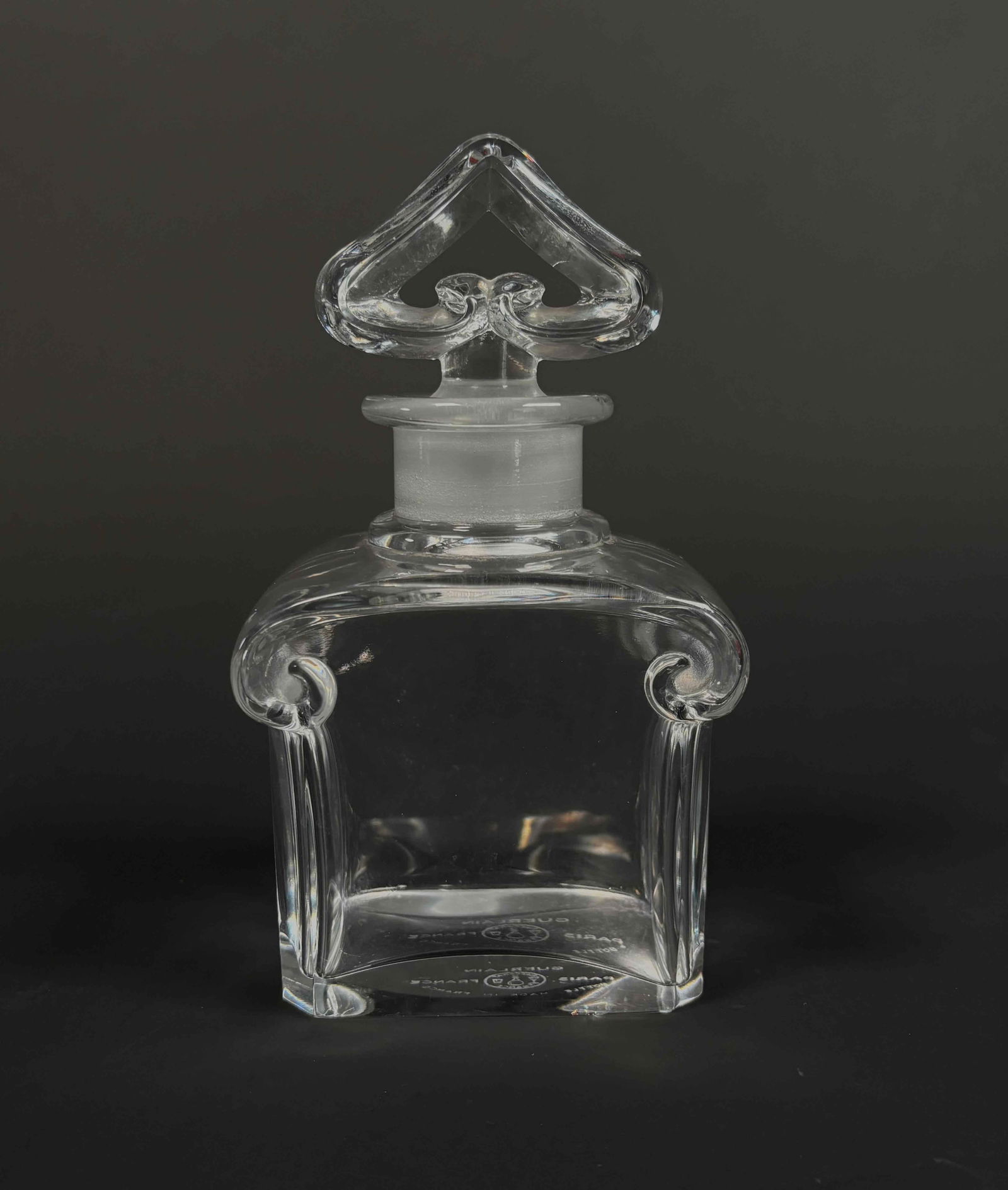 Guerlain Bacarat Perfume Bottle (Paris, France): Guerlain perfume bottle. (France) Bottle has #29 etched in the stopper as pictured. Guerlain hallmark is present on the base of the bottle along with the Bacarat logo. Excellent condition. Minimal chi