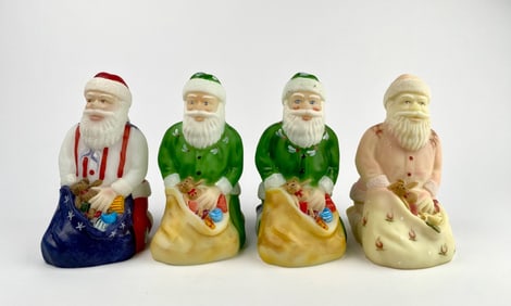 Set of Four Fenton Santa Figurines
