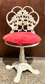 Ornate Cast Iron Swivel Chair With Red Cushion