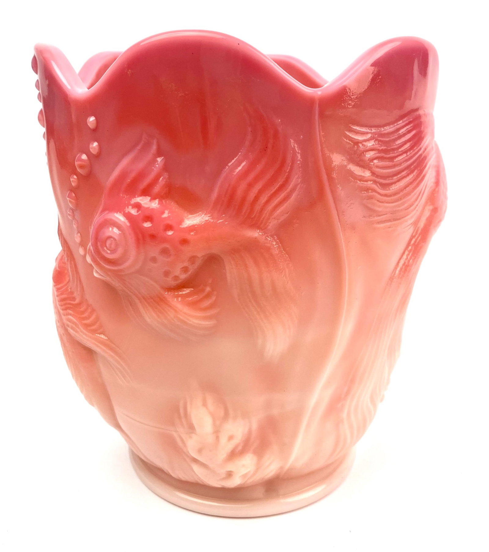 Fenton Glass Coral Peach Overlay Vase with Koi and Bubble Motif: Fenton Glass vase in coral peach overlay with a sculpted Koi fish and bubble motif. Vase features a scalloped rim and detailed texturing throughout. Marked "Fenton" on the base. In good condition with