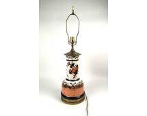 Porcelain Floral Lamp With Decorative Base: A porcelain floral lamp featuring a colorful floral design around the base and body. The lamp has a metal top with a brass-tone finish and decorative elements. It is functional with attached electrica