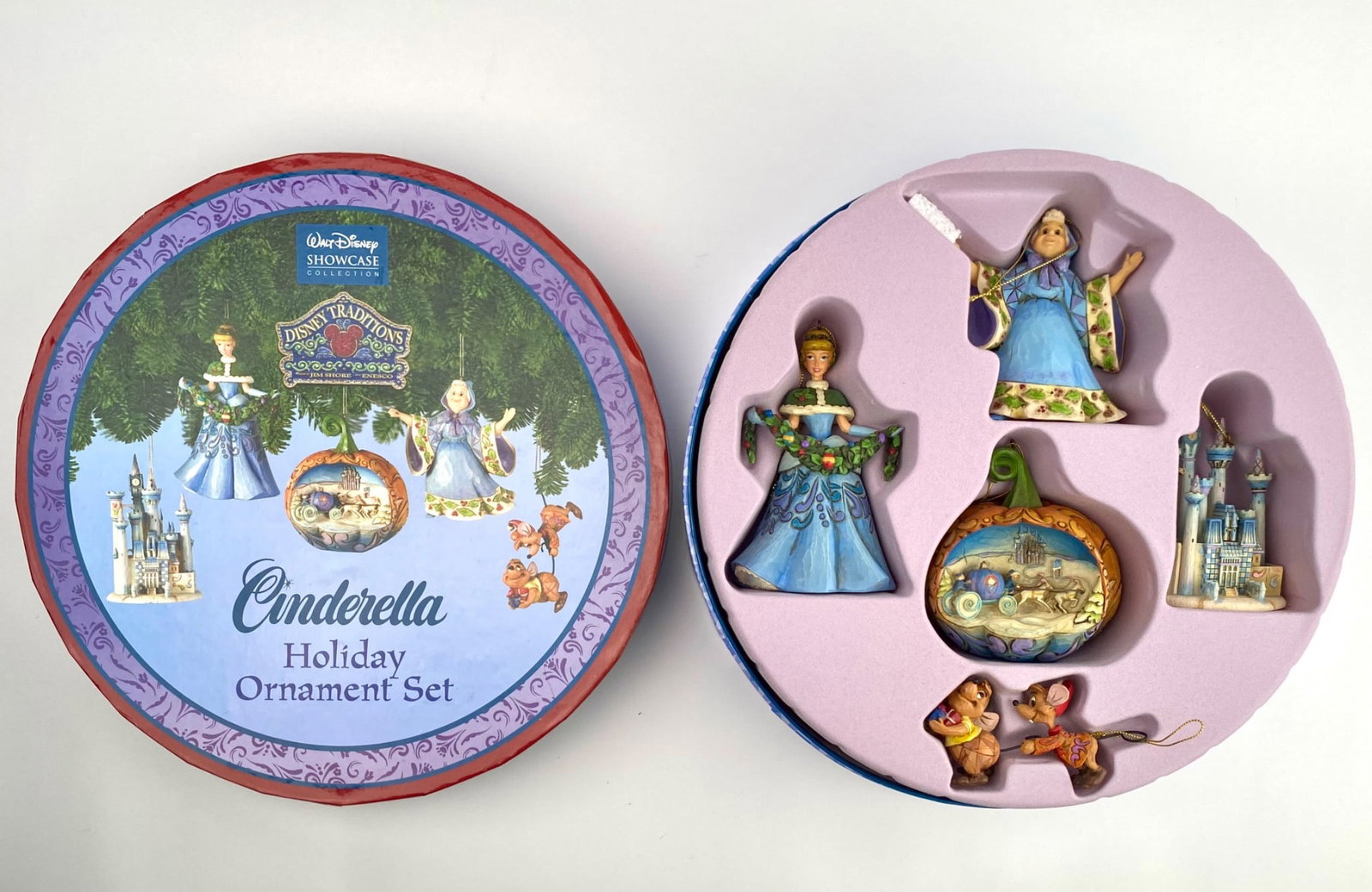 Disney Showcase Cinderella Holiday Ornament Set by Jim Shore: Disney Showcase Cinderella Holiday Ornament Set designed by Jim Shore and part of the Disney Traditions collection. The set includes five hand-painted, intricately detailed ornaments made of resin, fe
