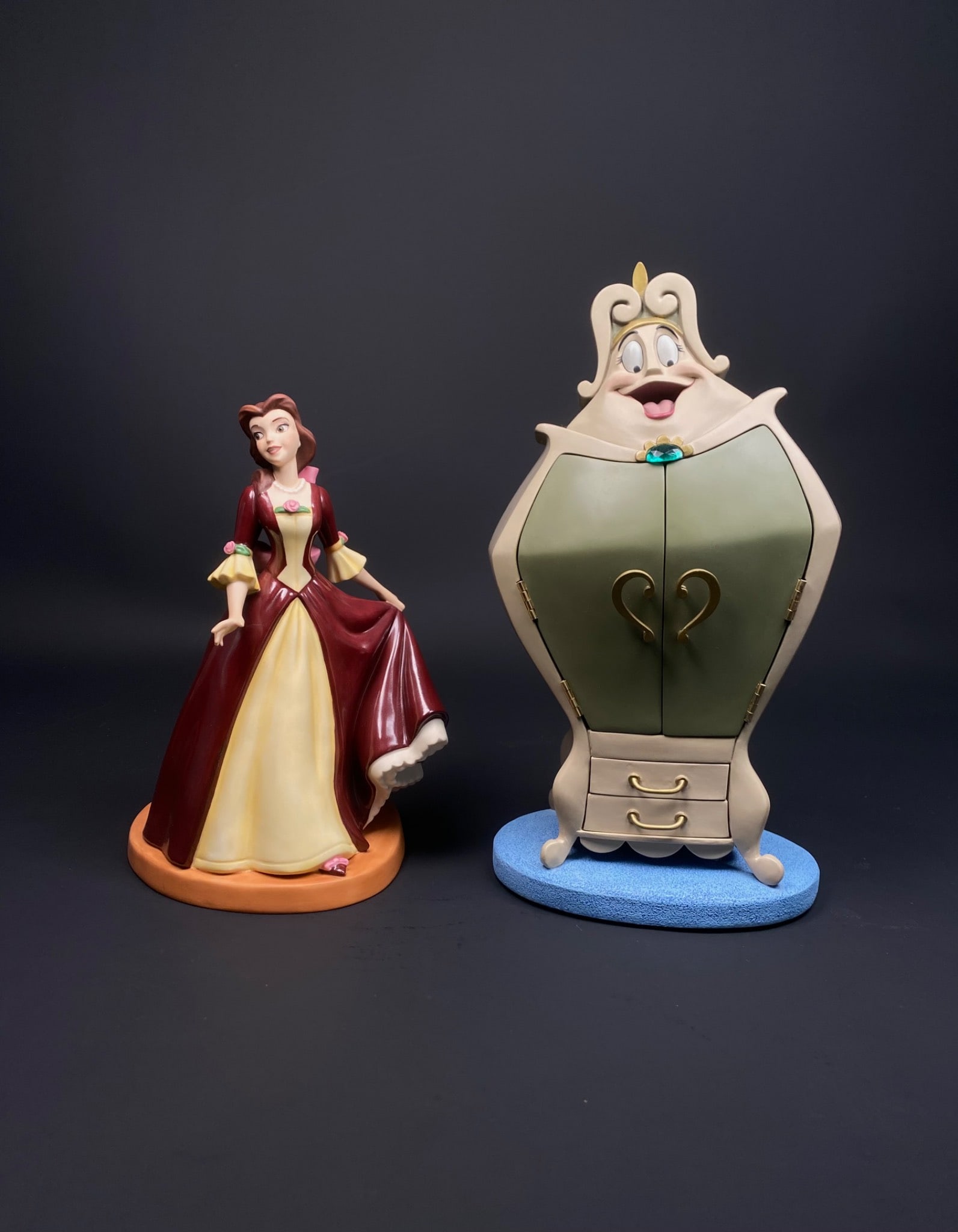 Disney Beauty and the Beast Belle and Wardrobe (COA in Original Box): Set of two Disney figurines Fromm Walt Disney Classics Collection, featuring Belle The Gift of Love and the Wardrobe Youâ€™ll Look Ravishing in This One from Beauty and the Beast. Bot