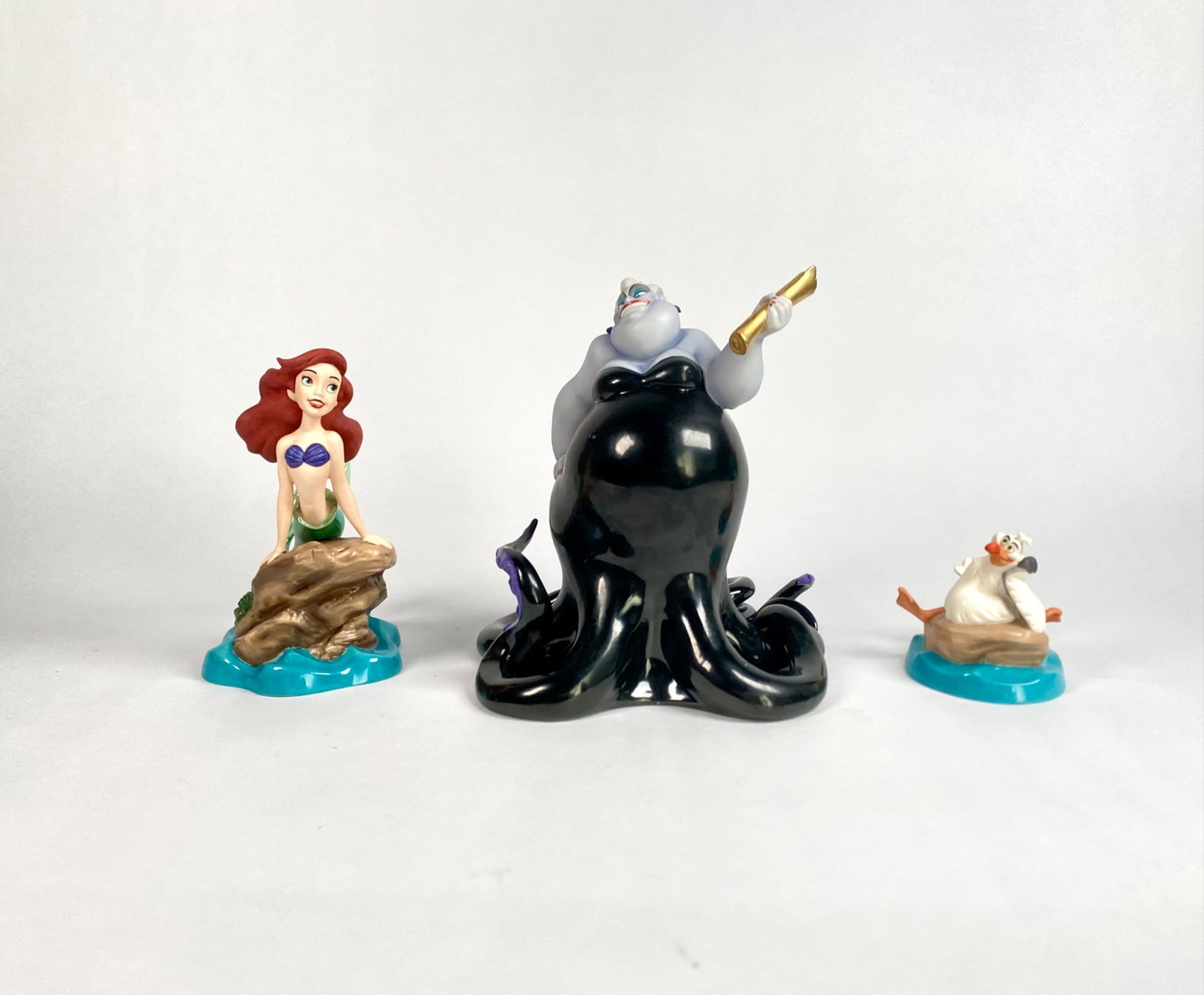 Disney Classics Collection The Little Mermaid (COA in Original Box): Set of three Walt Disney Classics Collection figurines from The Little Mermaid, featuring Ariel (Seaside Serenadeâ€, Ursula (We Made a Deal), and Scuttle (Muddled Mentor). Each piece 