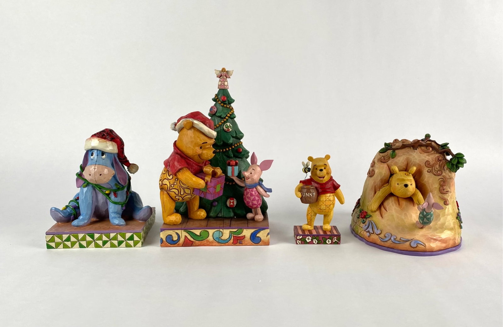 Set of Disney Traditions Winnie the Pooh (Original Boxes): Set of 4 Disney Winnie the Pooh figurines from the Enesco Jim Shore Disney Traditions collection. Included are â€˜Entangledâ€™ (#4027921), A Christmas Gift of Friendsh