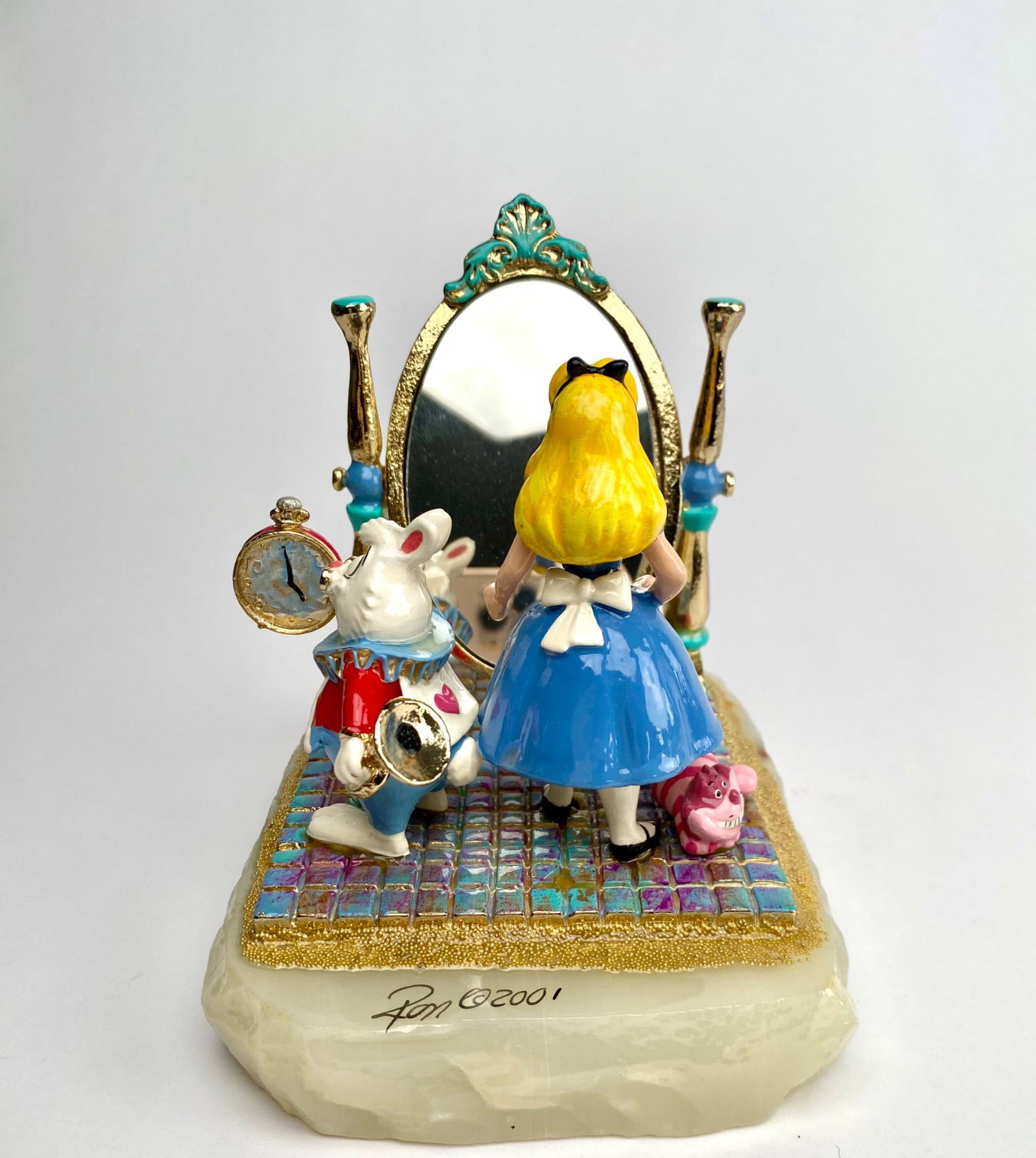 Disney Alice in Wonderland Figurine by Ron Lee: Disney Alice in Wonderland figurine designed by artist Ron Lee, signed and dated 2001. Made of cast metal with enamel and gold-tone accents on a polished stone base. Limited edition number 244 of 1200