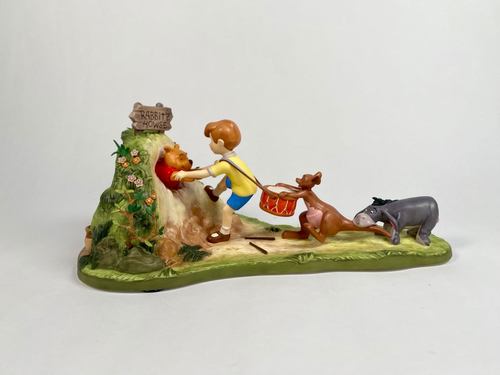 Walt Disney Classics Collection Winnie the Pooh (COA Original Box): Walt Disney Classics Collection figurine titled Winnie the Pooh and the Honey Tree, featuring Pooh Bear stuck in Rabbitâ€™s hole and Christopher Robin, Roo, and Eeyore attempting to h