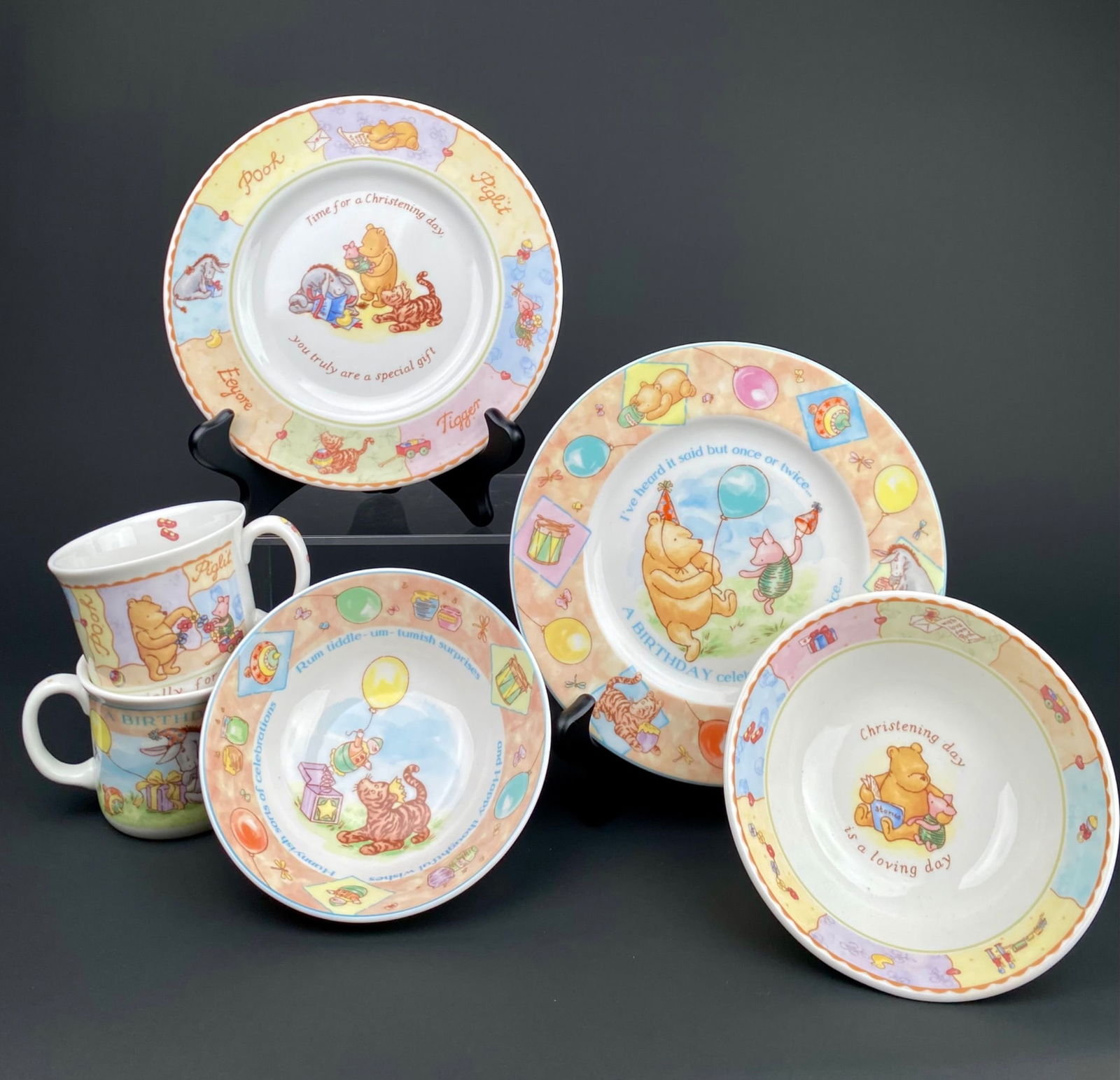 2 Royal Doulton Winnie the Pooh Dish Sets (Birthday and Christening): Royal Doulton porcelain baby sets featuring Winnie the Pooh decorations, designed for special occasions like birthdays and christenings. The set includes assorted items such as plates, bowls, and mugs
