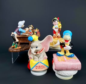 Set of Four Walt Disney Figurines?