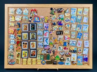Large Collection of Disney Pins on Display Board