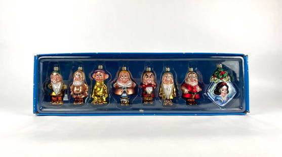 Sealed Disney Snow White and Dwarfs Christopher Radko Ornaments?: Set of eight glass Christmas ornaments featuring Snow White and the Seven Dwarfs from Disney. Manufactured for and sold by the Disney Store. The ornaments are stored in their original blue box with st