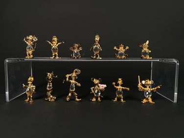 Set of GOld Plated Disney Lencia mini Figures?