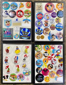 Collection of Disney Pins and Buttons in 4 Display Cases