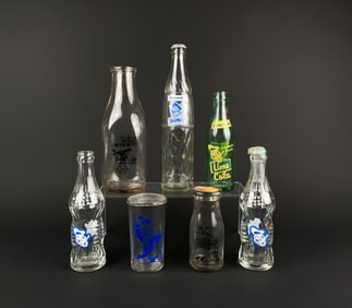 Collection of Seven Bottles, Including Donald Duck Cola and Lime Cola