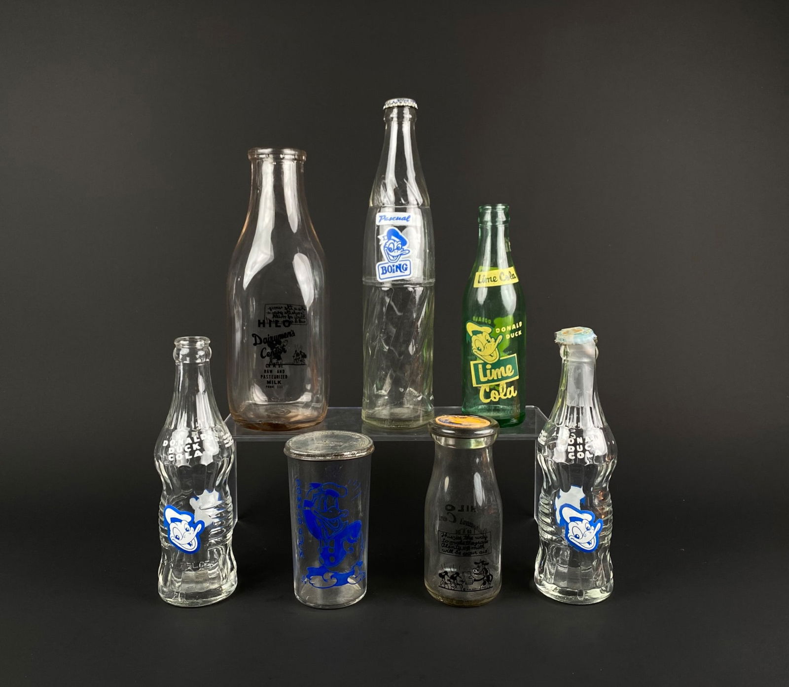 Collection of Seven Bottles, Including Donald Duck Cola and Lime Cola (1 of 11)