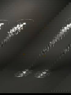 Pair of Ingrid Bohemia Crystal Disney Nightmare Before Christmas Glasses: Set of two hand made Ingrid Bohemia crystal glasses featuring etched designs of Disney characters Jack Skellington and Sally from The Nightmare Before Christmas. Both glasses display intricate detaili