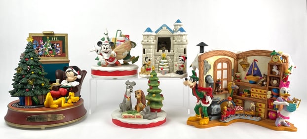 Collection of Walt Disney Christmas Figurines and Decorations