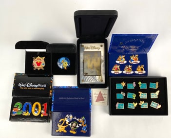 Collection of Walt Disney Commemorative Pins and Items in Boxes
