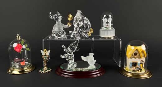 Collection of Disney Themed Glass and Figurine Items with Domes