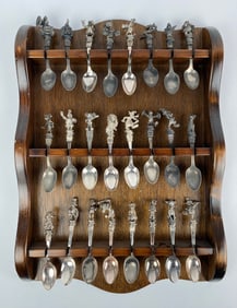 Collection of 24 Figural Collector Spoons with Wooden Display Rack