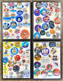 Collection of Disney Buttons in 4 Display Cases