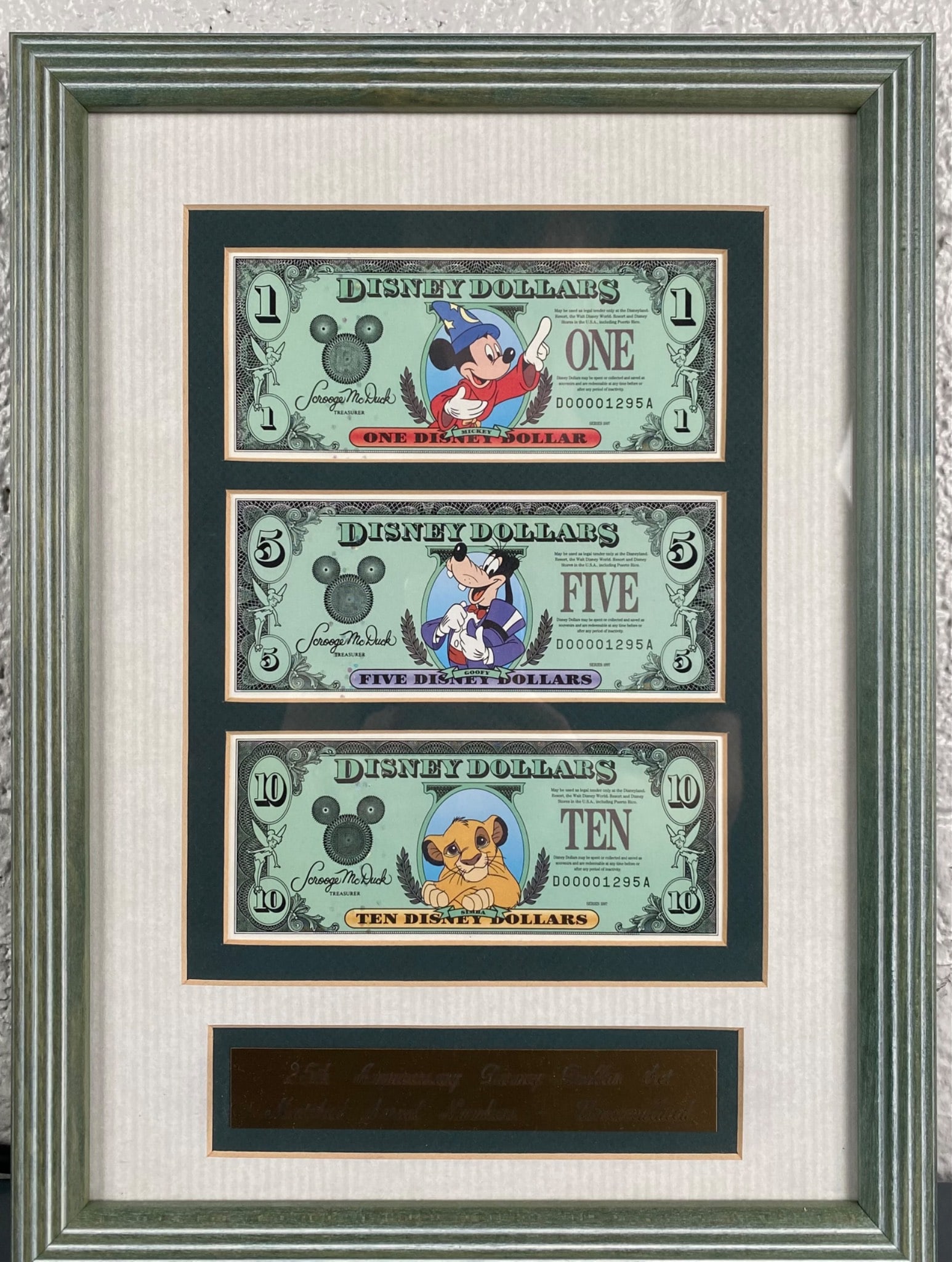 Framed 25th Anniversary Disney Dollar Set (1 of 9)