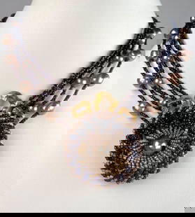 Miriam Haskell Multi Strand Necklace with Beaded Pendant: Signed Miriam Haskell multi strand statement necklace featuring a large central floral medallion composed of intricately hand wired seed beads, simulated pearls and gilt metalwork. The design incorpor