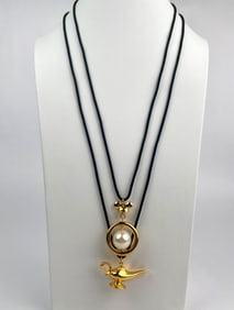 Pair of Disney and Napier Pendant Necklaces