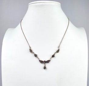 Sterling Silver Floral Motif Necklace with Wings and Droplet Pendant