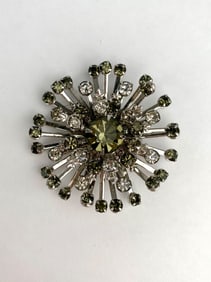 Mid Century Starburst Brooch with Green and Clear Rhinestones