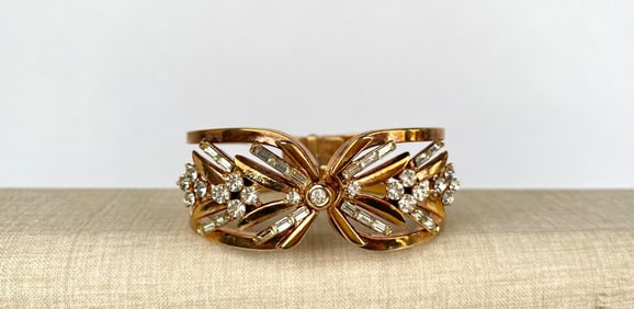 Trifari Gold Tone Rhinestone Cuff Bracelet with Floral Motif