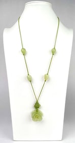 Green Necklace With Floral Jade Pendant and Bead Accents