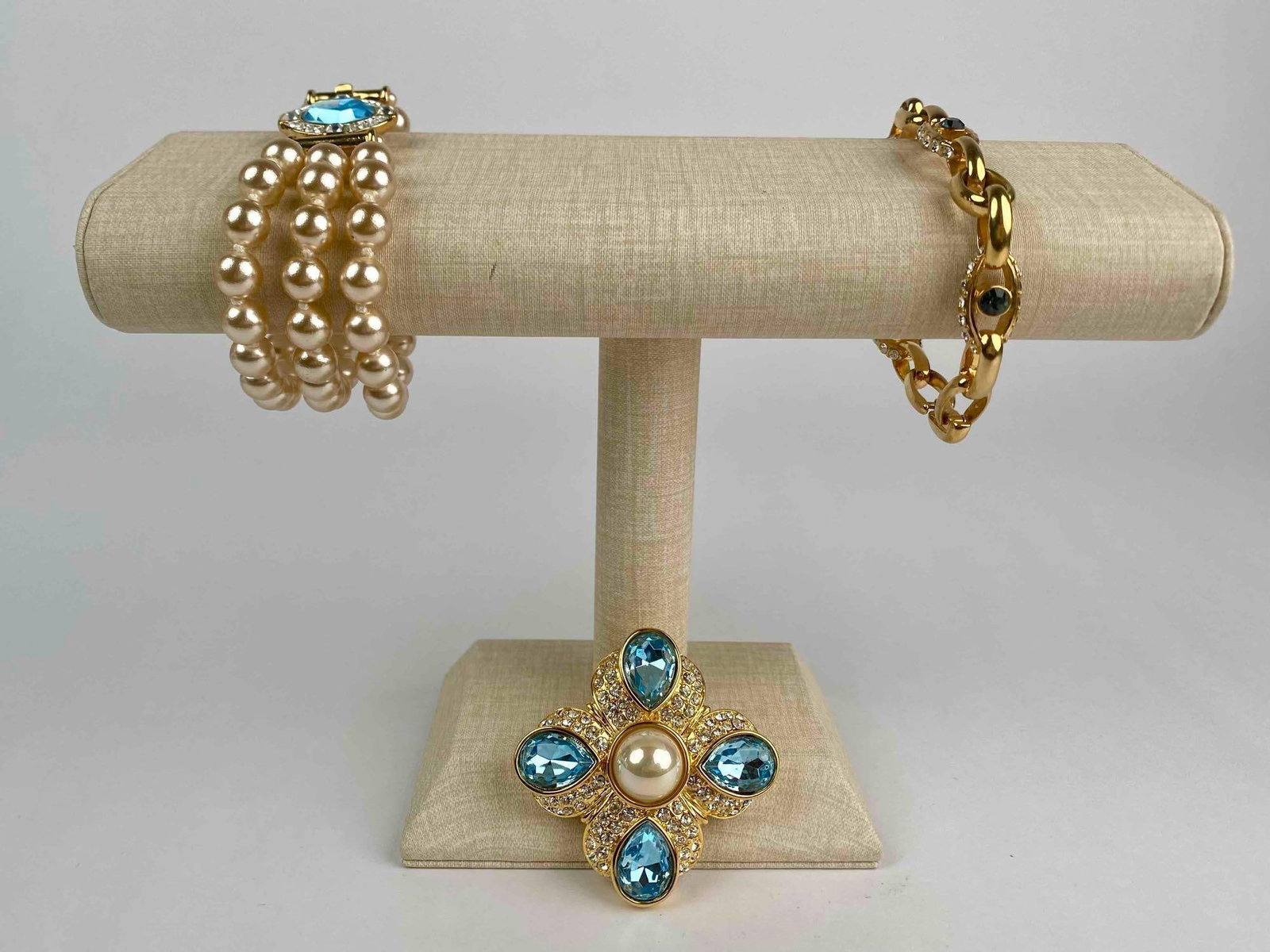 Nolan Miller costume jewelry set featuring three statement pieces. The set includes a triple-strand (1 of 12)