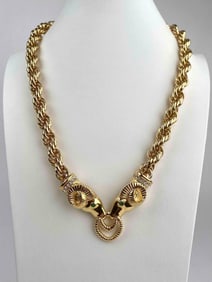 Signed Kenneth Jay Lane (KJL) statement necklace featuring two gold tone rams head facing on