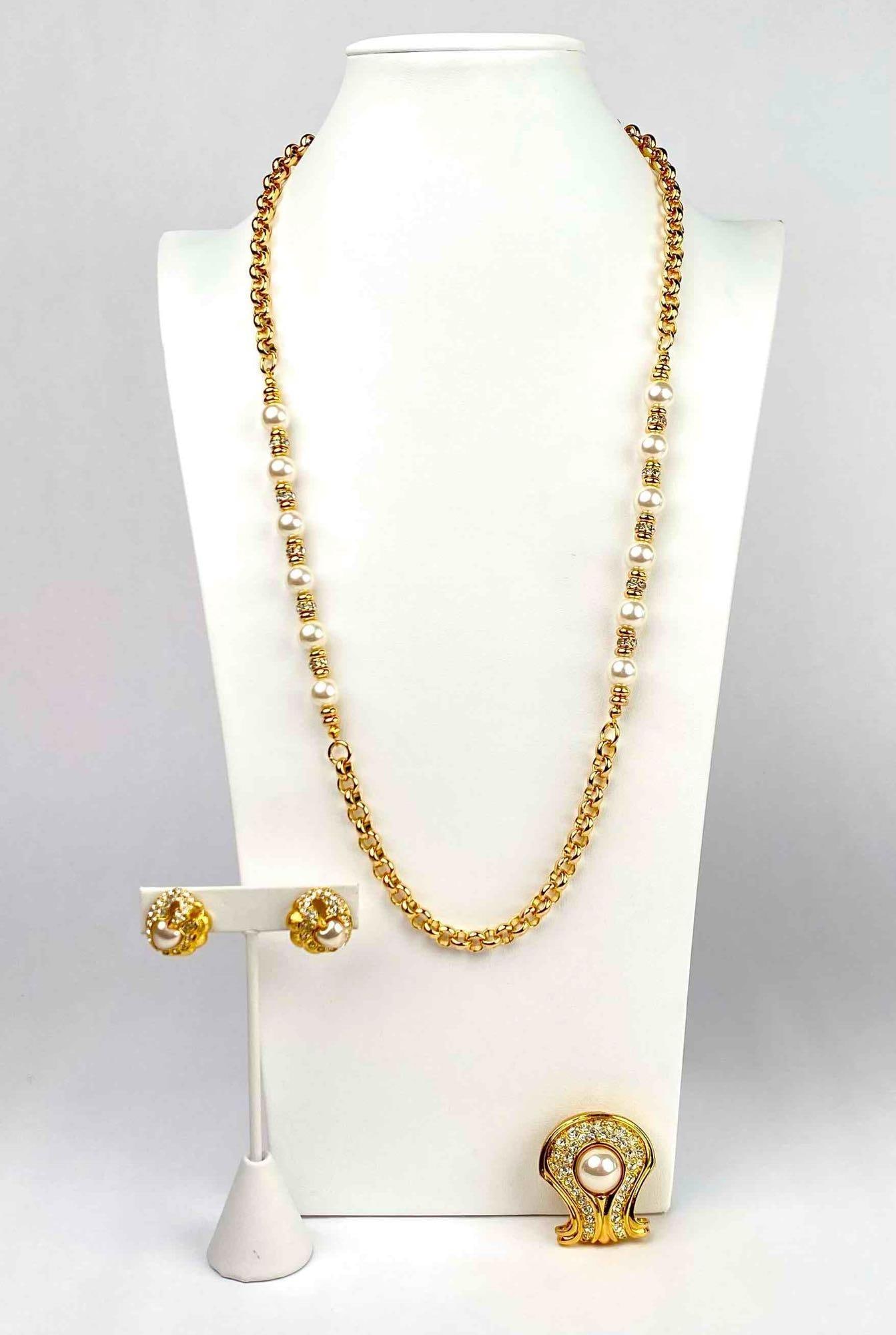 Set of 3 jewelry pieces by Nolan Miller. Set includes a necklace with faux pearls and a gold tone (1 of 12)