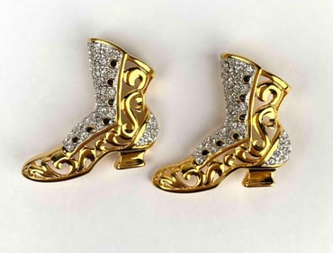 Set of 2 shoe shaped brooches by Kenneth Jay Lane. Shoes are gold tone with silver tone rhinestone