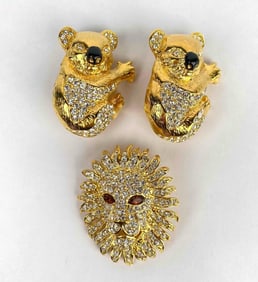 Lot of 3 gold tone animal pins with rhinestones by Kenneth Jay Lane. The first brooch is lion head