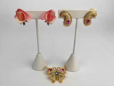 Collection of three signed Kenneth Jay Lane (KJL) jewelry pieces, including two pairs of clip on