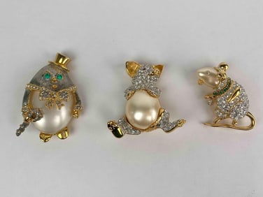 Group of three signed KJL (Kenneth Jay Lane) brooches featuring animal characters with pearlized