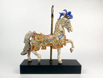 Cybis Charger Bisque Porcelain Carousel Horse (1984): This piece is titled Charger and is a limited edition bisque porcelain carousel horse by Cybis Studios. Crafted in the United States with finely modeled musculature, scalloped saddle blanket, gold tri