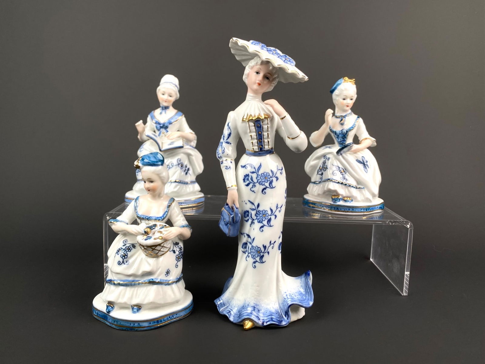 Set of Four KPM Blue and White Porcelain Figurines (1 of 12)