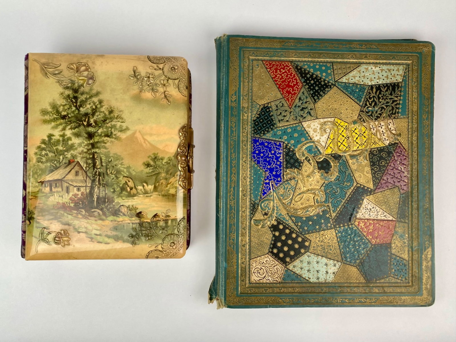 Victorian Photography Album and Scrapbook Set Featuring Artwork and Ephemera: Set includes one Victorian-era photography album with gold gilt pages, a scenic embossed cover, and a functional clasp, containing photographic portraits mounted within decorative card slots. Accompan