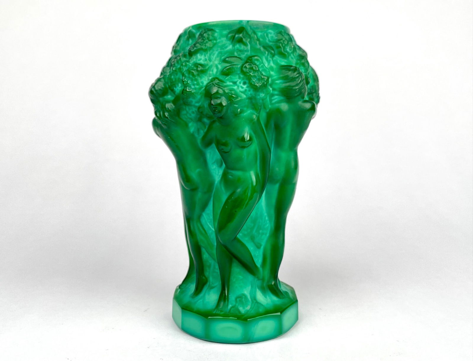 Art Deco Malachite Glass Vase by H.Hoffmann (1930s): 1930s art deco malachite glass vase featuring a sculptural design of nude female figures surrounded by a floral and vine motif. The vase has an octagonal base and a textured surface. Vase is in good c