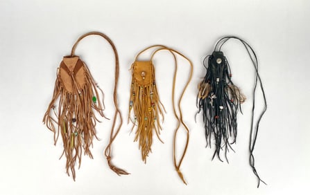 Three Leather Medicine Bags with Fringe and Bead Embellishments