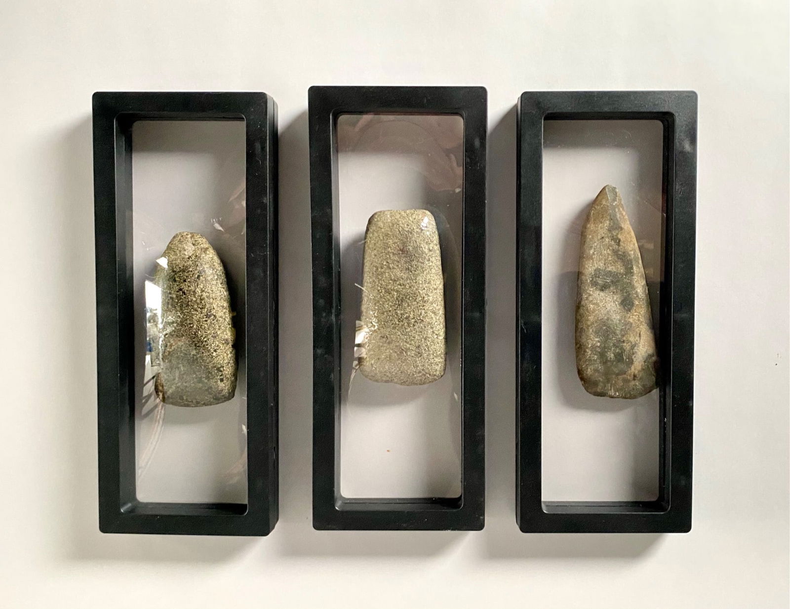 Three Stone Tools in Cases (1 of 5)